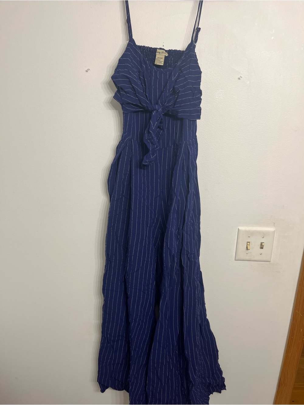 Blue striped open back wide flare leg jumpsuit size medium
